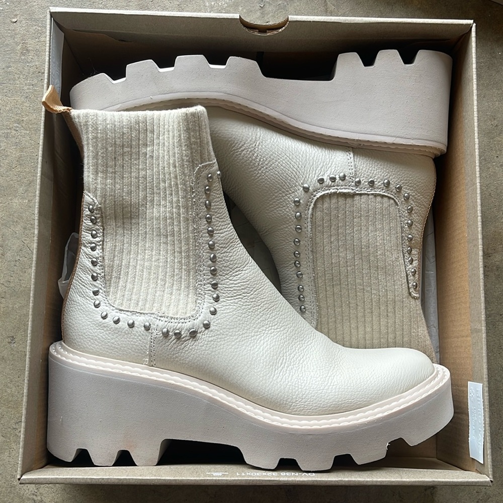 Dolce Vita ivory studded boots.
